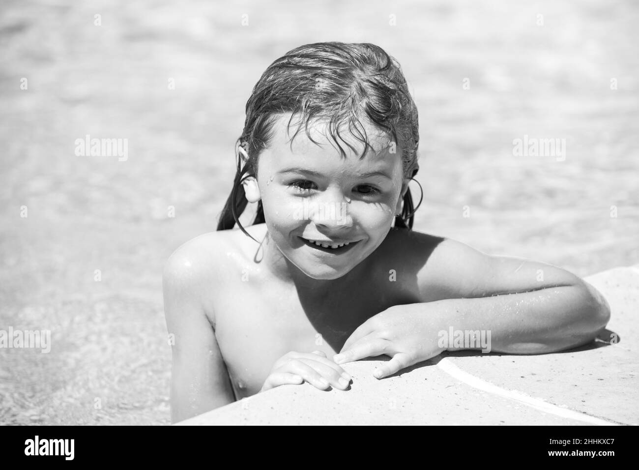 Portrait of child boy swim in swimming pool Stock Photo Alamy