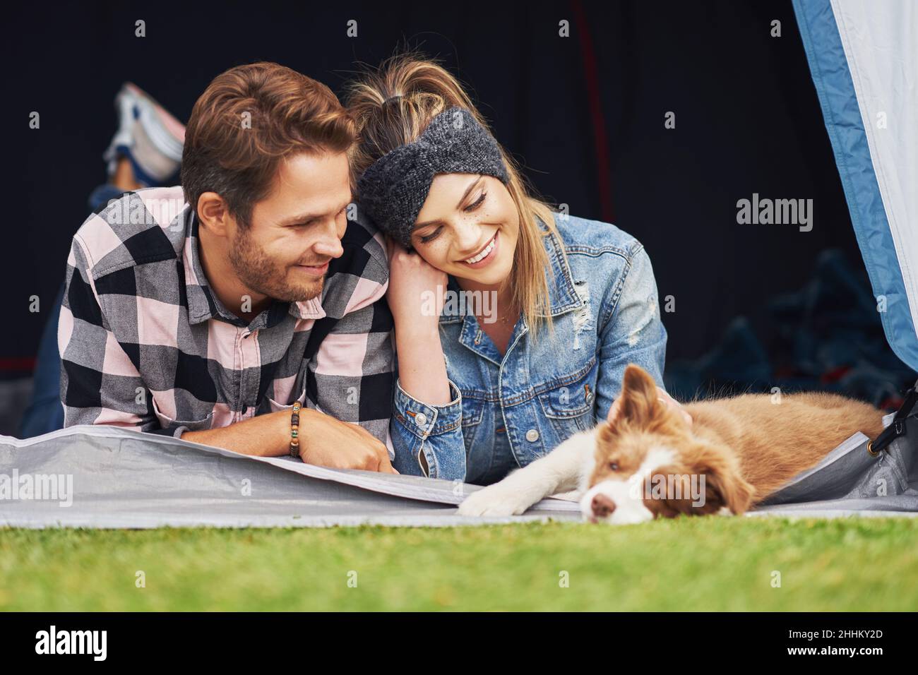 Young nice couple having fun on camping Stock Photo