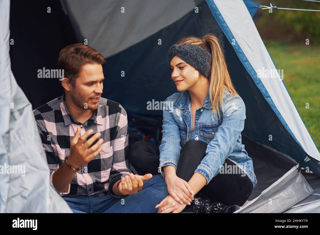 Young nice couple having fun on camping Stock Photo