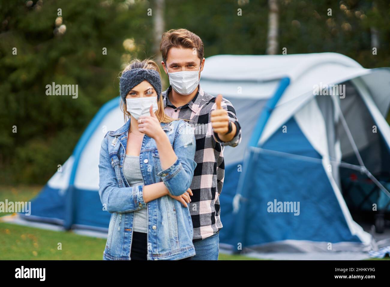 Young nice couple having fun on camping Stock Photo