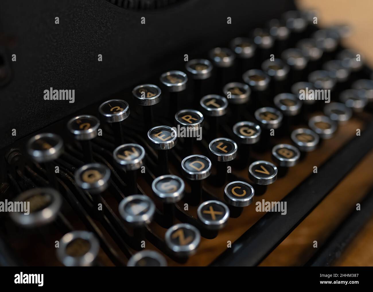 Old fashioned circular round type writer keys, vintage retro industrial style typing machine. Stock Photo