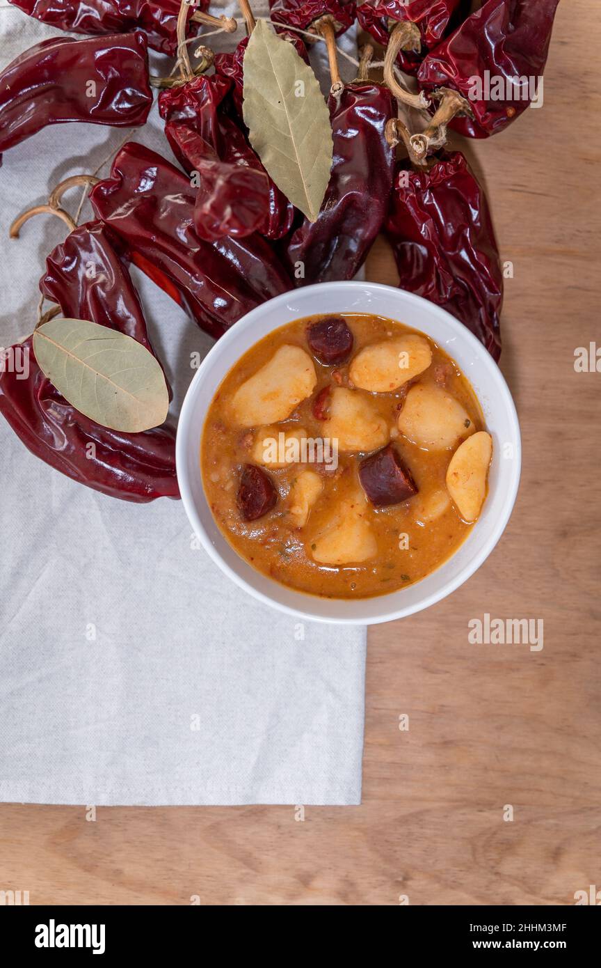 creative potato soup cream peppers beans chorizo sopa riojana Stock Photo