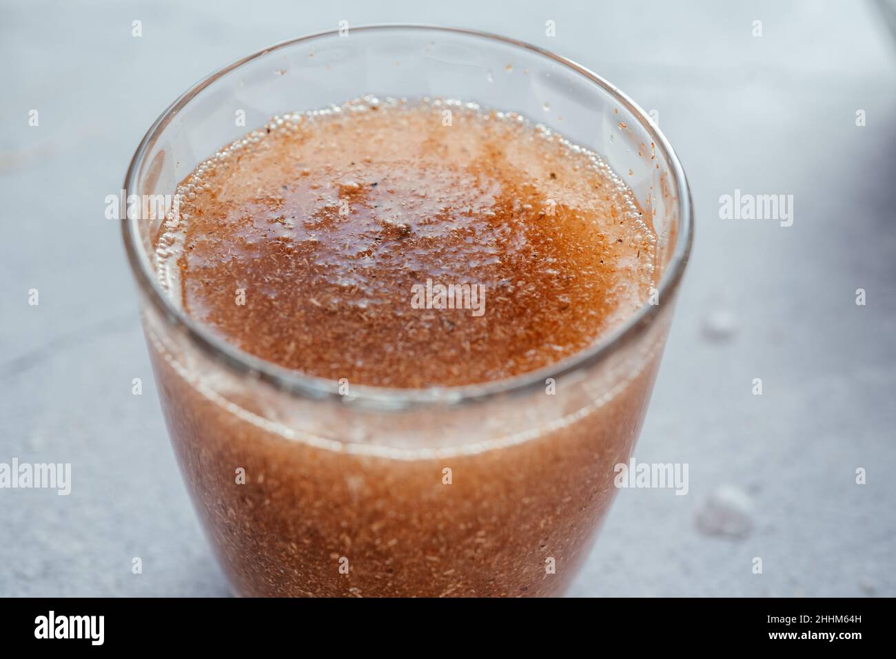 A glass of water soluble psyllium husk dietary fiber supplement, healthy diet morning routine Stock Photo