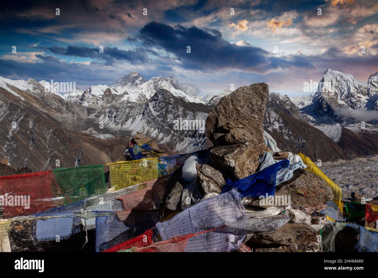 Prayer flags are blowing in the wind on the Renjo La pass, 5430 m., in Nepal Stock Photo