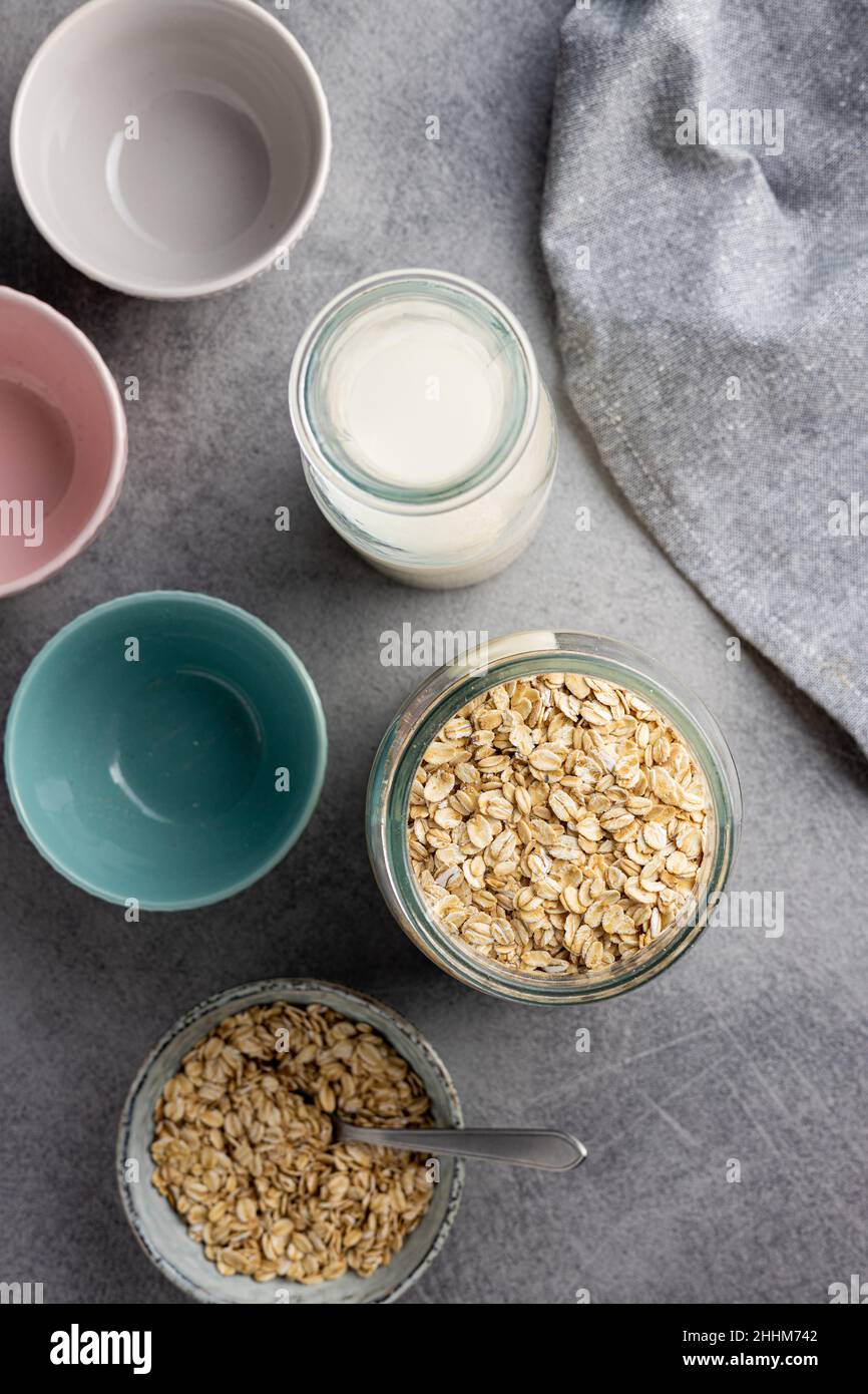 Breakfast cereals. Uncooked oatmeal. Raw oat flakes. Top view. Stock Photo