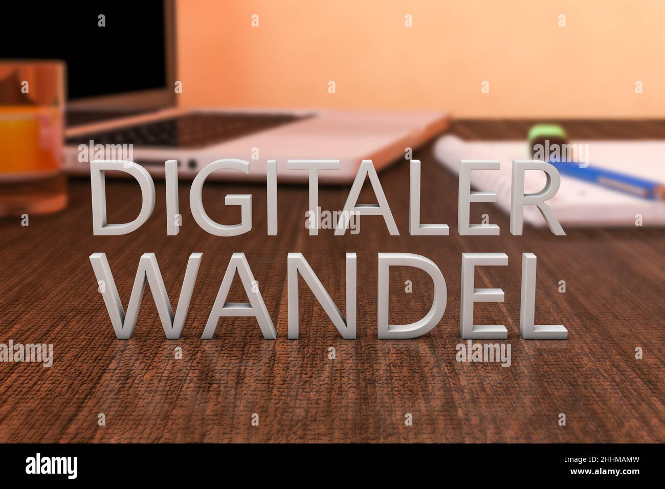 Digitaler Wandel - german word for digital change or digital business transformation - letters on wooden desk with laptop computer and a notebook. 3d Stock Photo