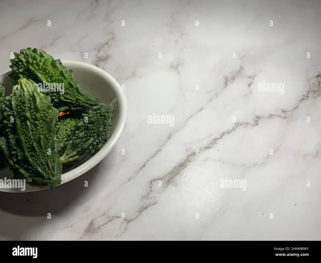Bitter melon and Bitter gourd. Green Vegetables Concept Stock Photo Alamy