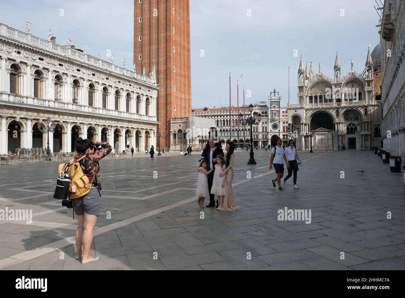 Tourist walk in Saint Mark's Square in Venice, Italy, June 20, 2020. Stock Photo
