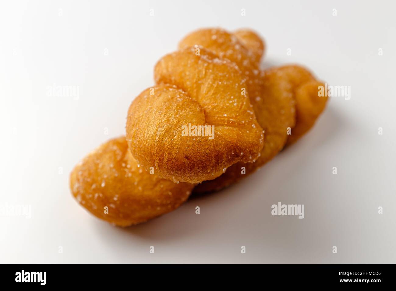 Twisted bread stick on white background Stock Photo