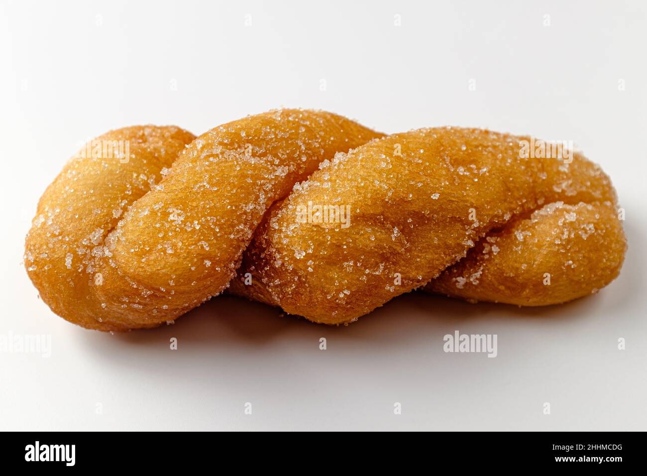 Twisted bread stick on white background Stock Photo