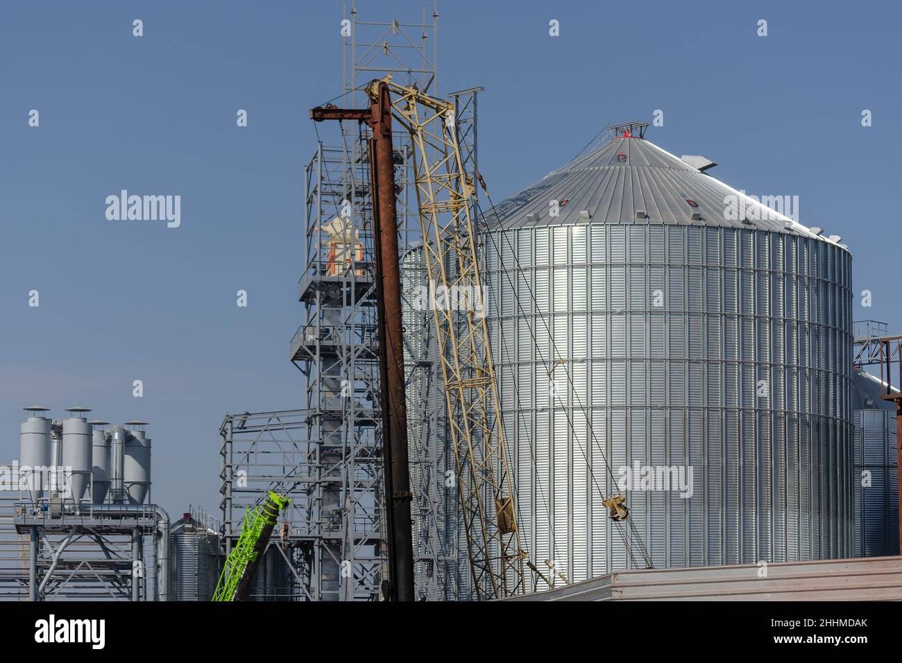 Construction site. Installation of cylindrical silos for grain storage