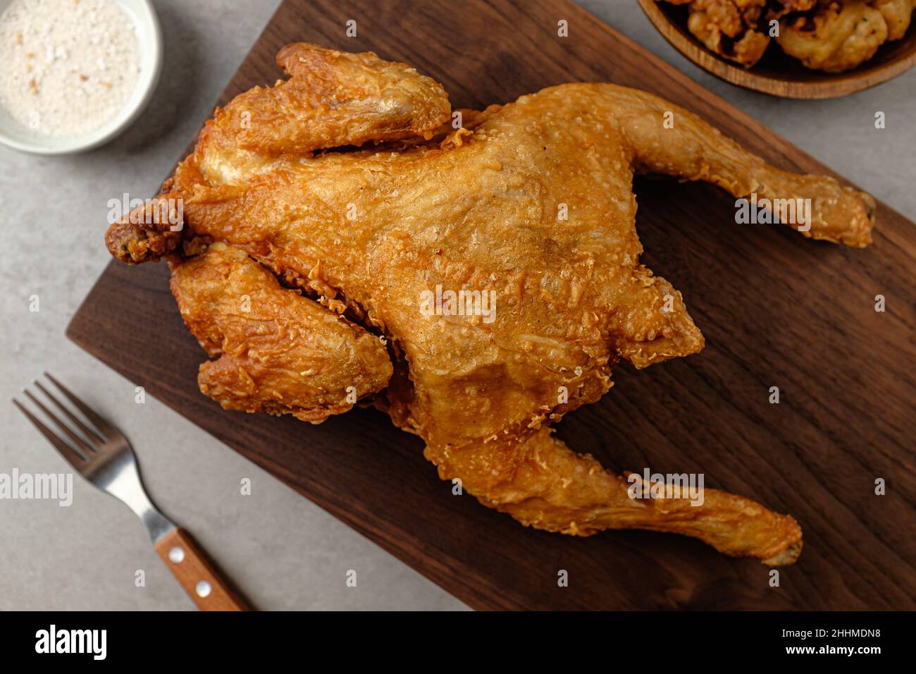 Crispy and savory deepfried whole chicken Stock Photo Alamy