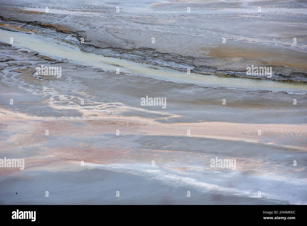 Muddy waters in a decantation pond. Toxic residuals from a copper mine decating in a settling basin. Geological industrial mining landscape. Geamana, Stock Photo