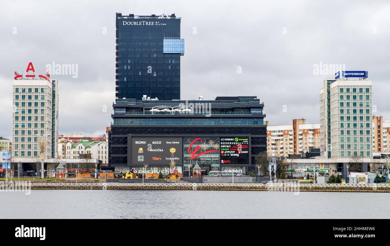 The building of the DoubleTree by Hilton hotel and shopping center in the center of Minsk.  View from the Svisloch river embankment. Stock Photo