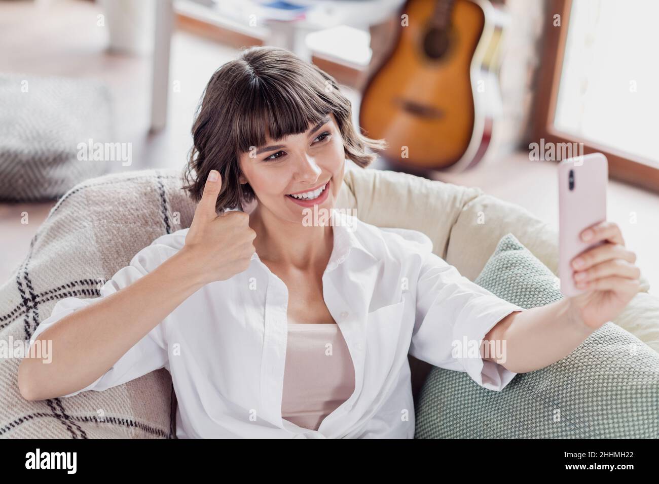 Photo of funny brunette hairdo young lady do selfie wear white shirt ...