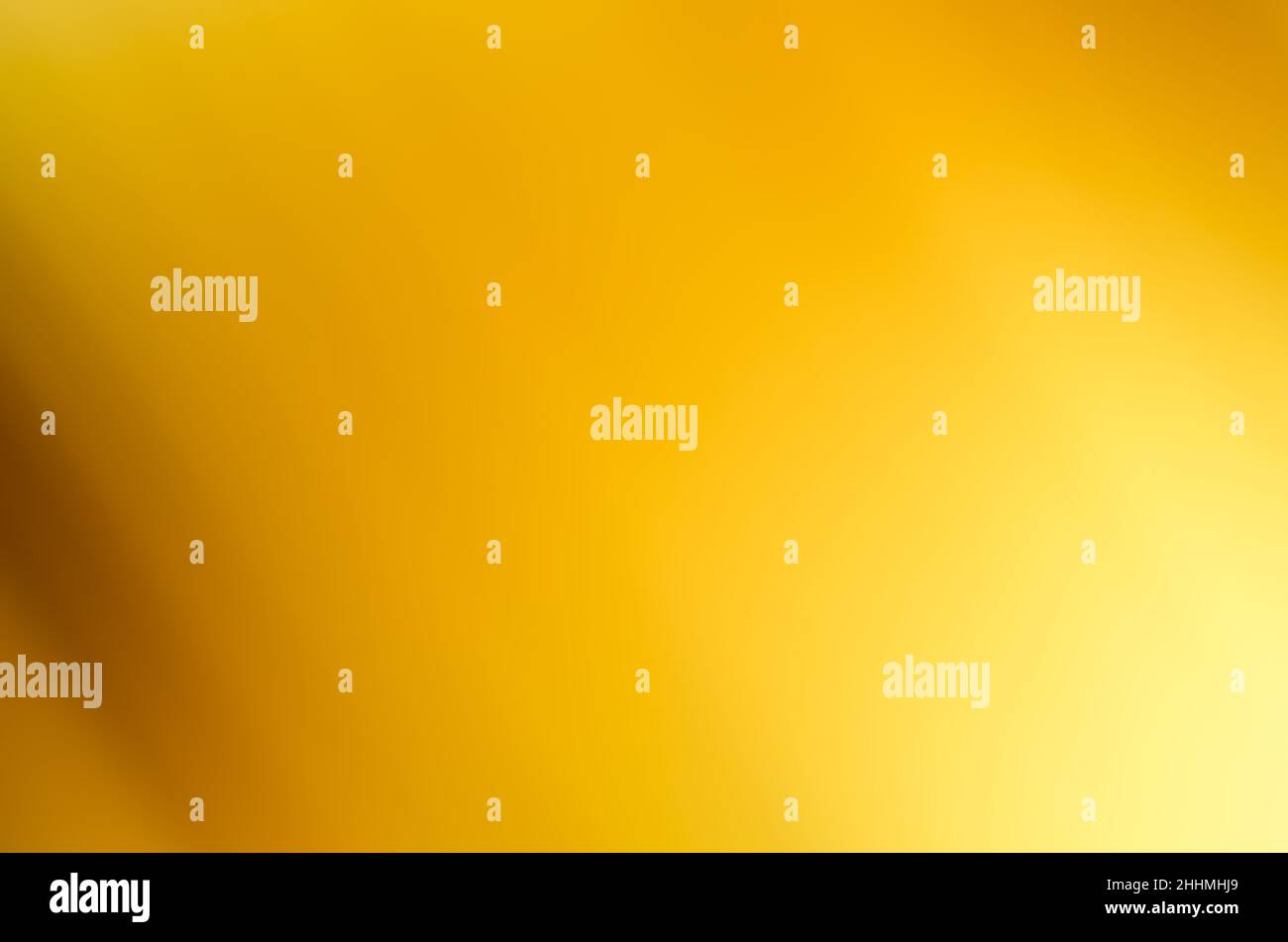 Abstract yellow and orange multicolored background with blurry ...