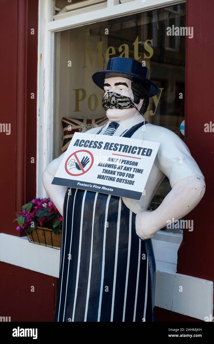 Covid masked shop mannequin humour in summer 2021 Stock Photo - Alamy