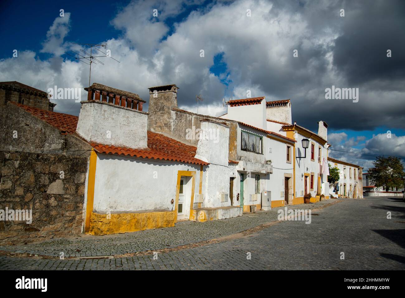 a street and alley in the old Town of Flor da Rosa in Alentejo in  Portugal.  Portugal, Estremoz, October, 2021 Stock Photo