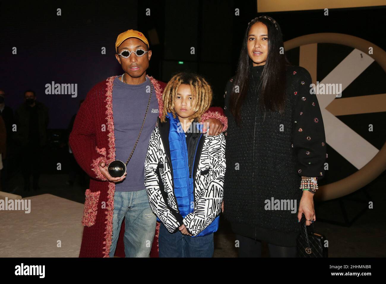 Paris, France. January 25, 2022, Pharrell Williams, his son Rocket Ayer  Williams and his wife Helen Lasichanh during the Chanel Haute Couture  fashion show as part of the Paris Fashion Spring Summer
