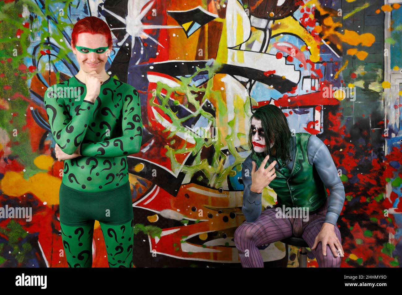 GEEK ART - Bodypainting and Transformaking: Joker meets Riddler Photoshooting with Patrick Kiel as Joker and Paul Skupin as Riddler at Duesterwald studio on January 23, 2022 in Hamelin - A project by the photographer Tschiponnique Skupin and the bodypainter Enrico Lein Stock Photo