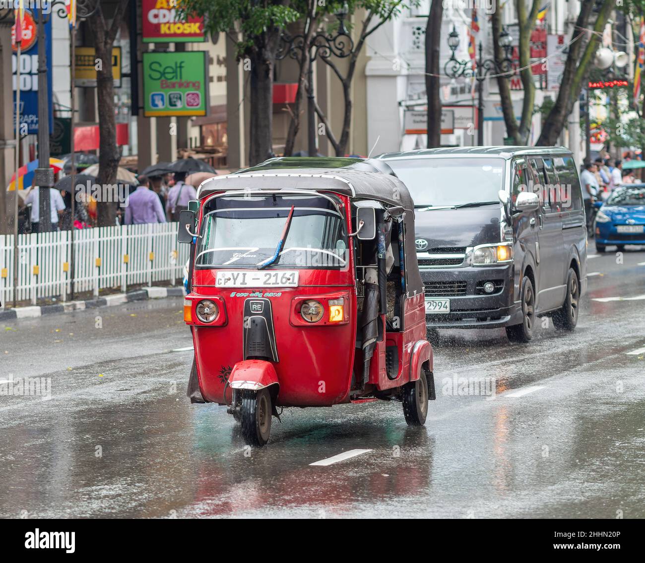 Auto rickshaw on a rainy day in Kandy, Sri Lanka. Stock Photo