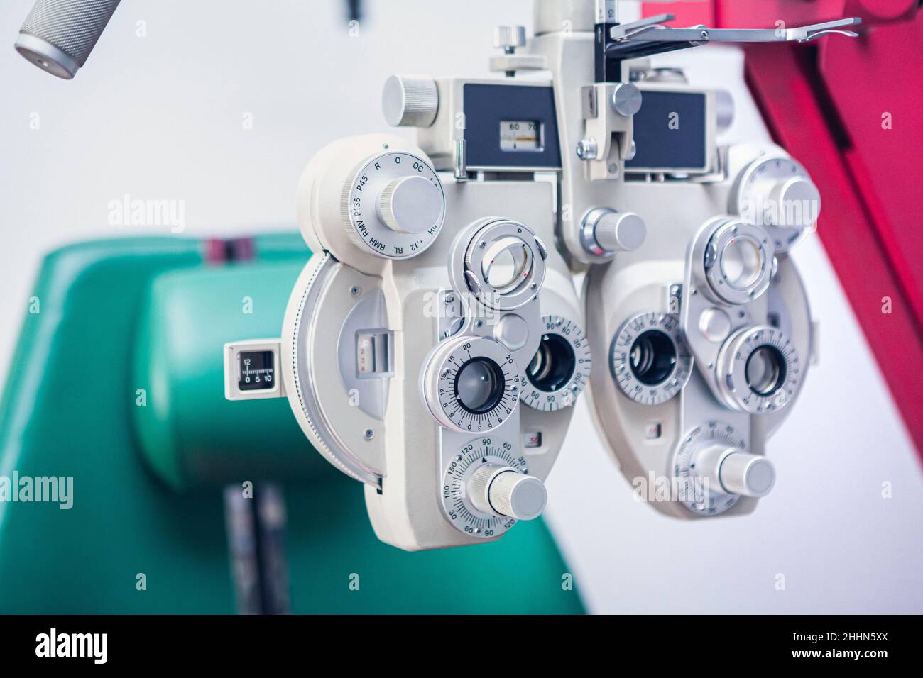 Optician's instrument for measuring sight. Eye test equipment. White