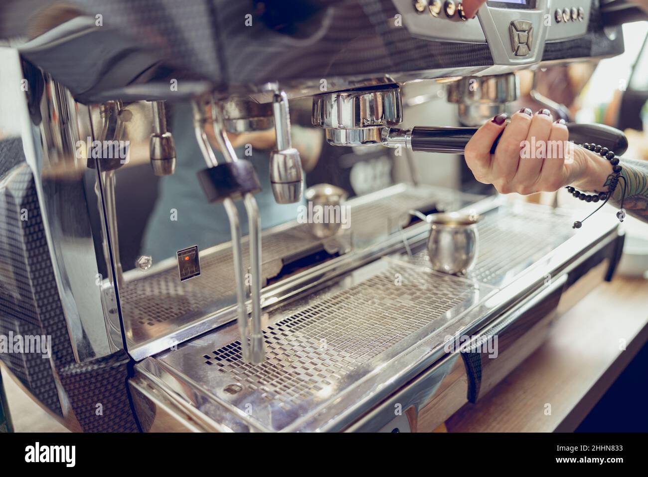 Female barista hand making coffee in cafeteria Stock Photo Alamy