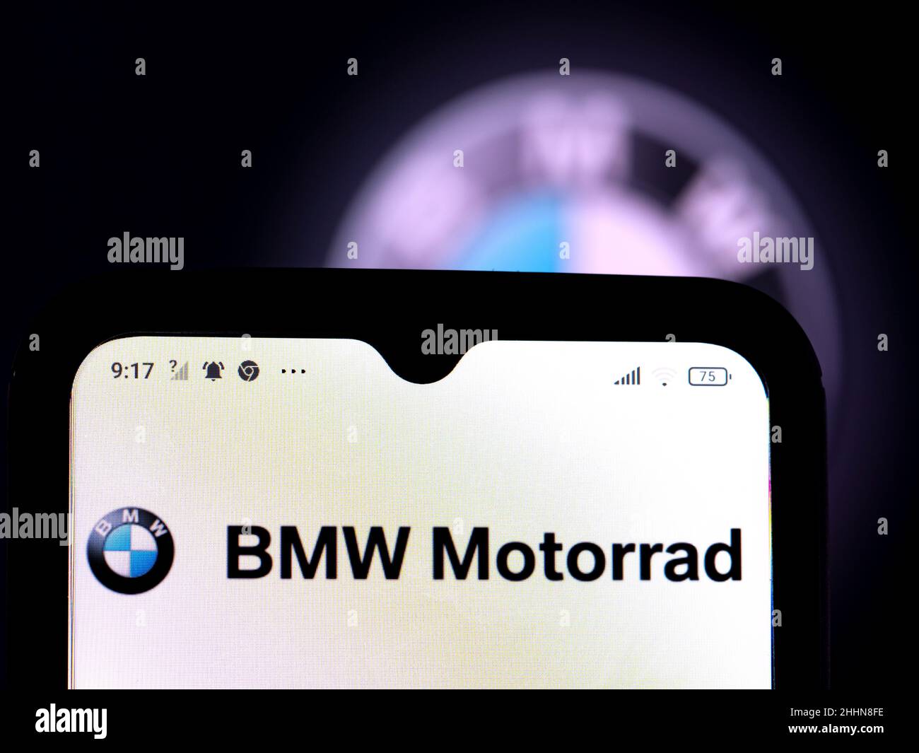 In this photo illustration, the BMW Motorrad logo is seen displayed on
