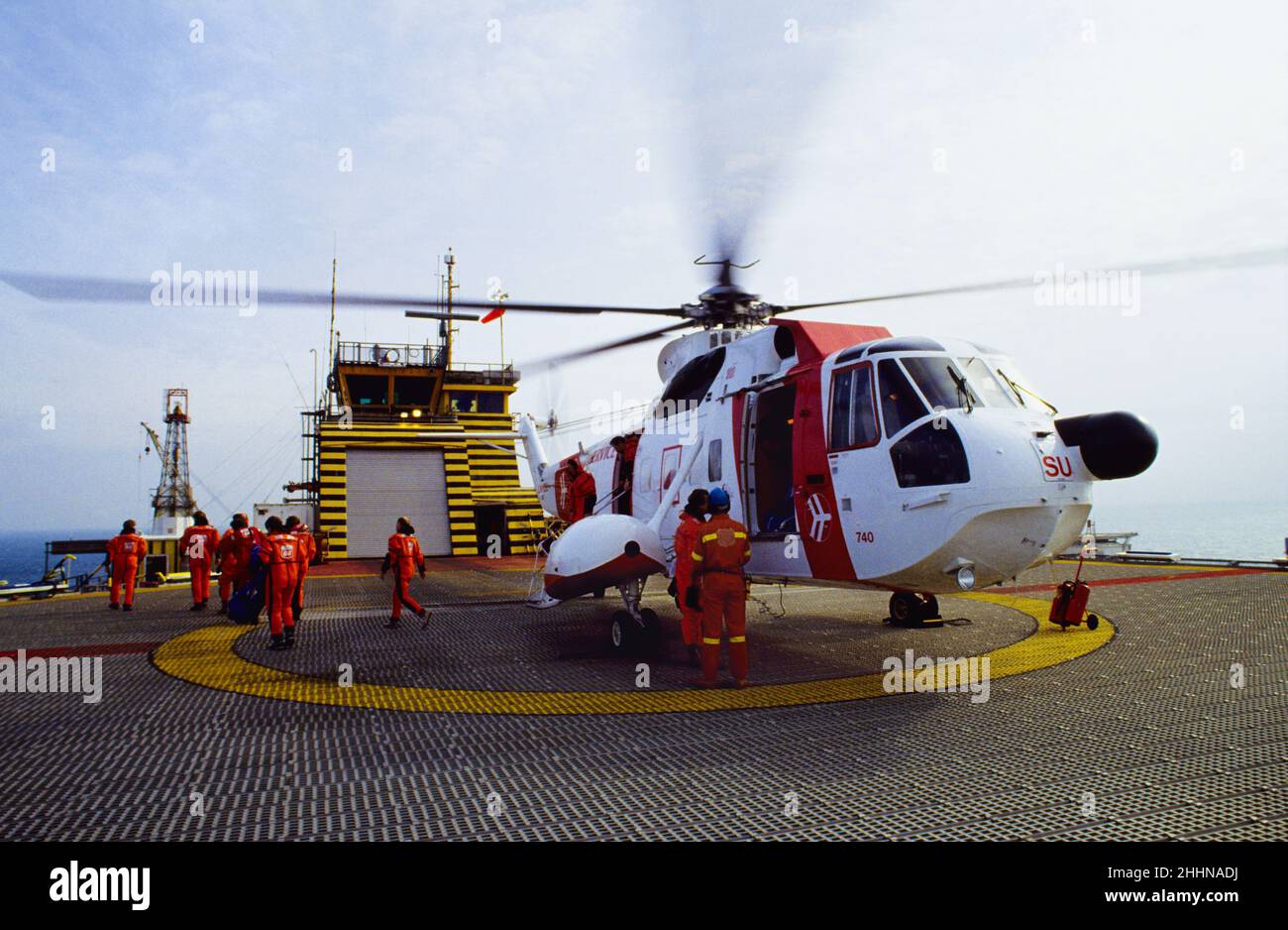 Helicopter on oilrig Stock Photo