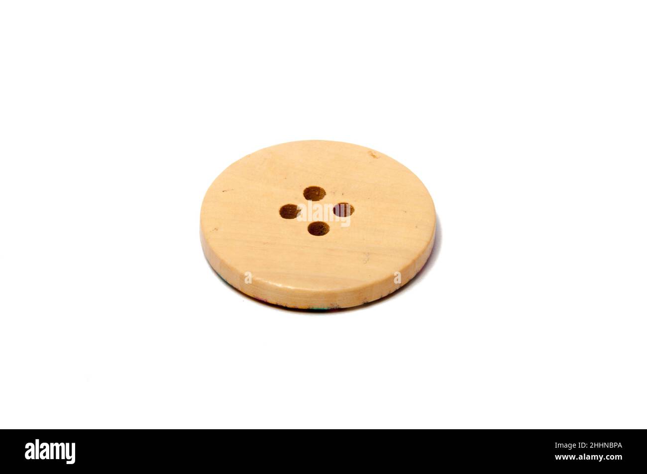 Button for clothes isolated on the white Stock Photo