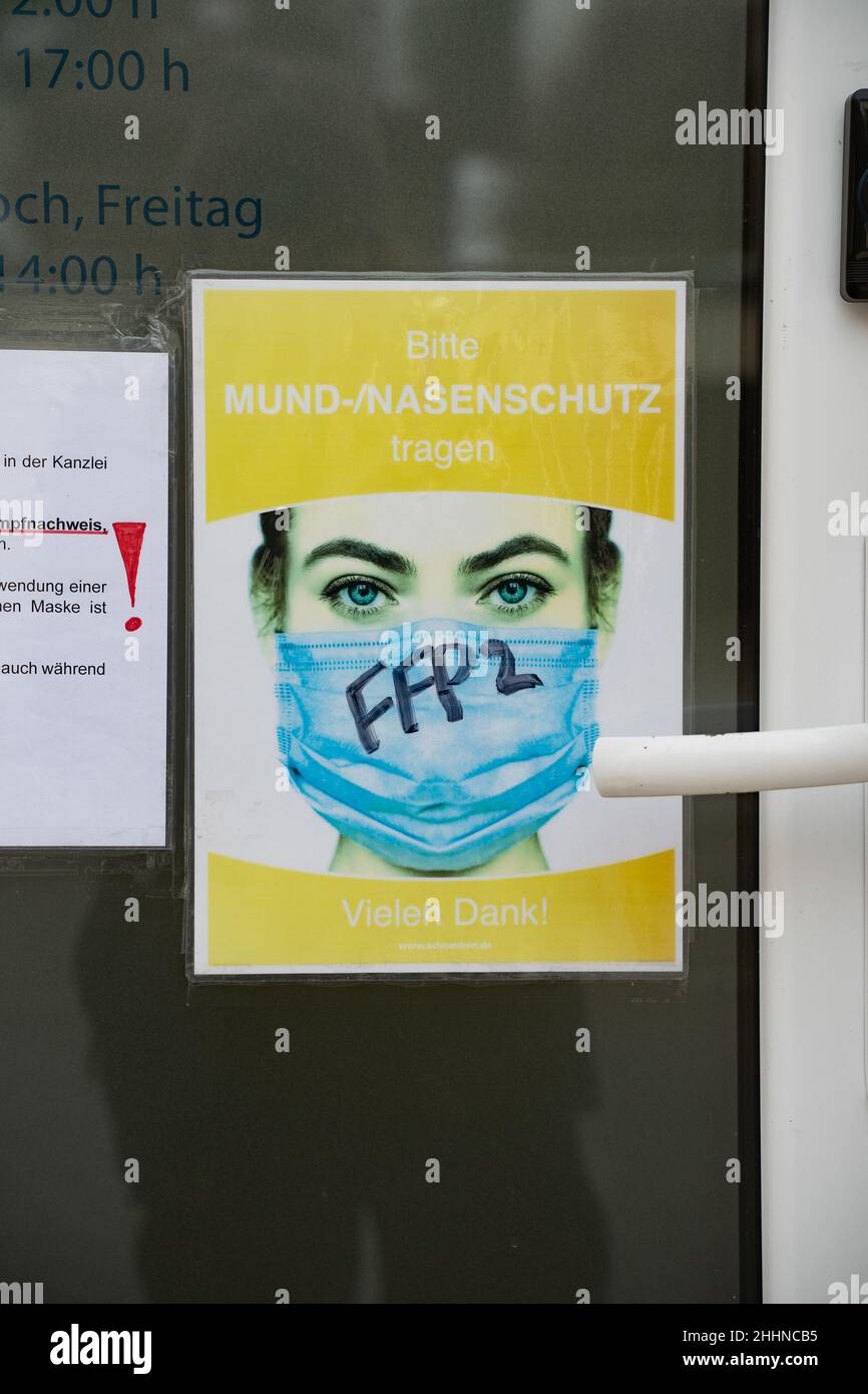 Signs on masks regulations at a store on January 25, 2022 in Starnberg, Bavaria.  While Covid infections are rapidly increasing due to the Omicron variant. (Photo by Alexander Pohl/Sipa USA) Stock Photo