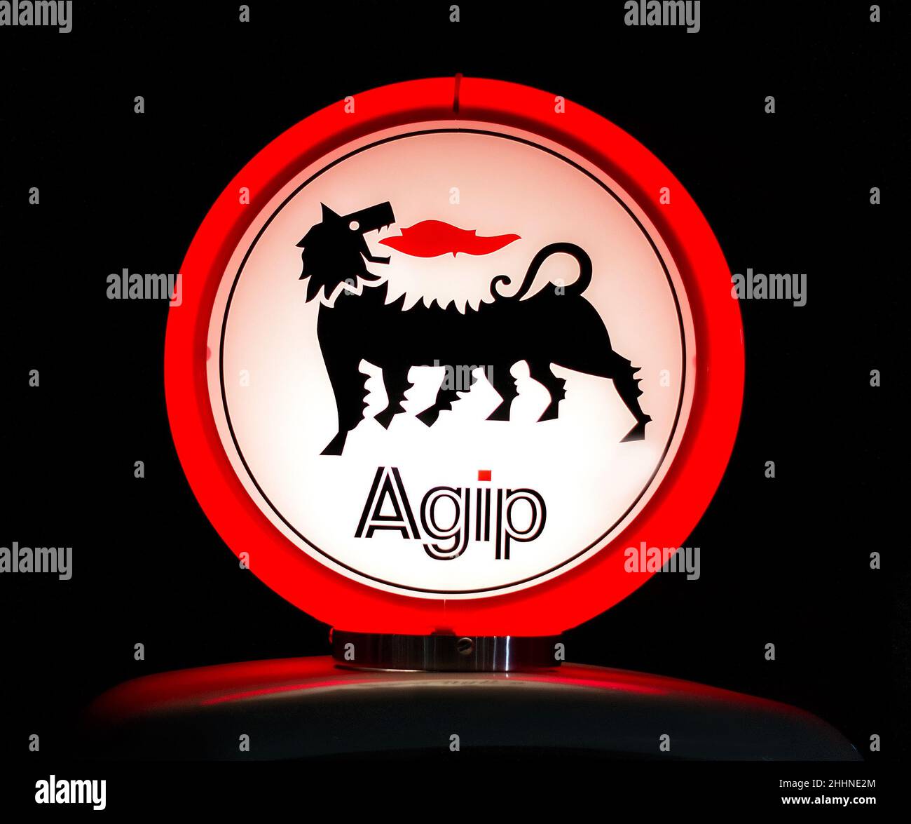 Agip ( Eni S.p.A. company) logo illuminated sign on the petrol pump in ...