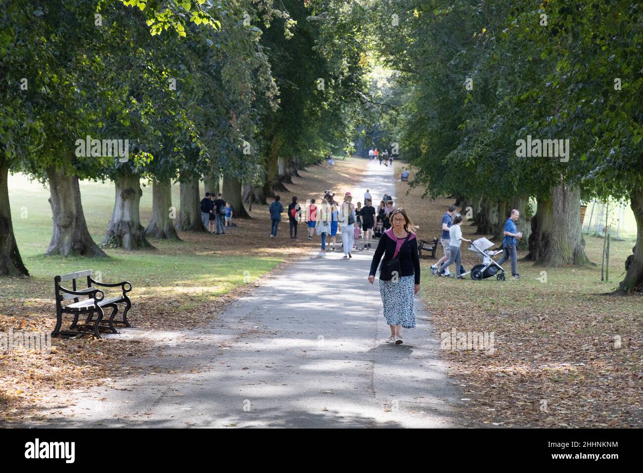 Harpenden Common, Harpenden, Hertfordshire UK; People walking along a