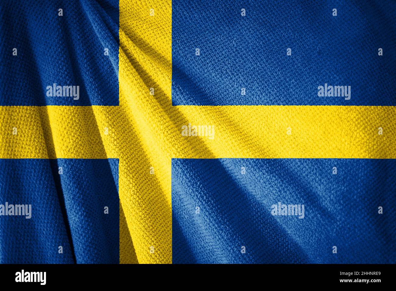 Swedish flag on towel surface illustration with, country symbol of Sweden Stock Photo