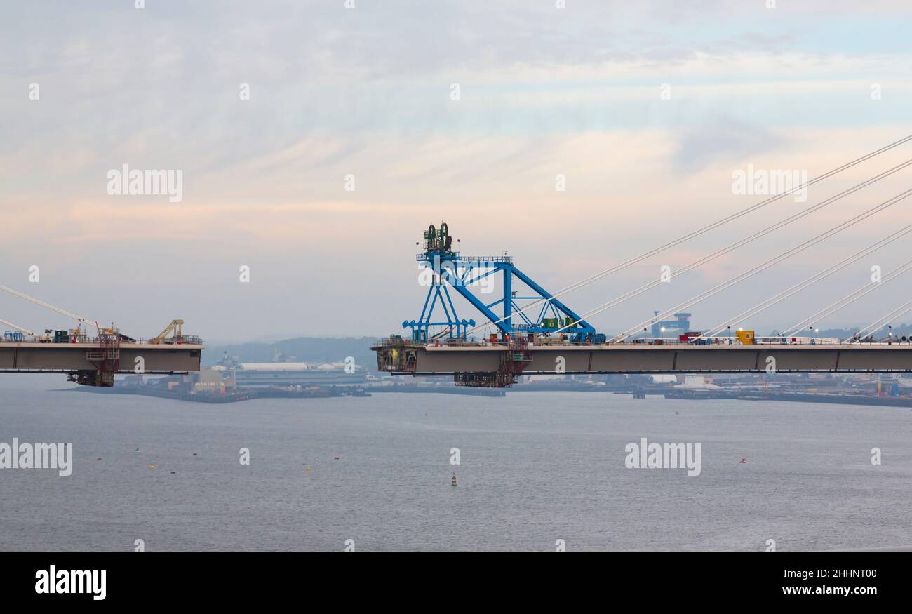 The Forth Road bridge replacement, the Queensferry Crossing, nears completion over the Firth of Forth. A small gap remains to be connected. Edinburgh, Stock Photo