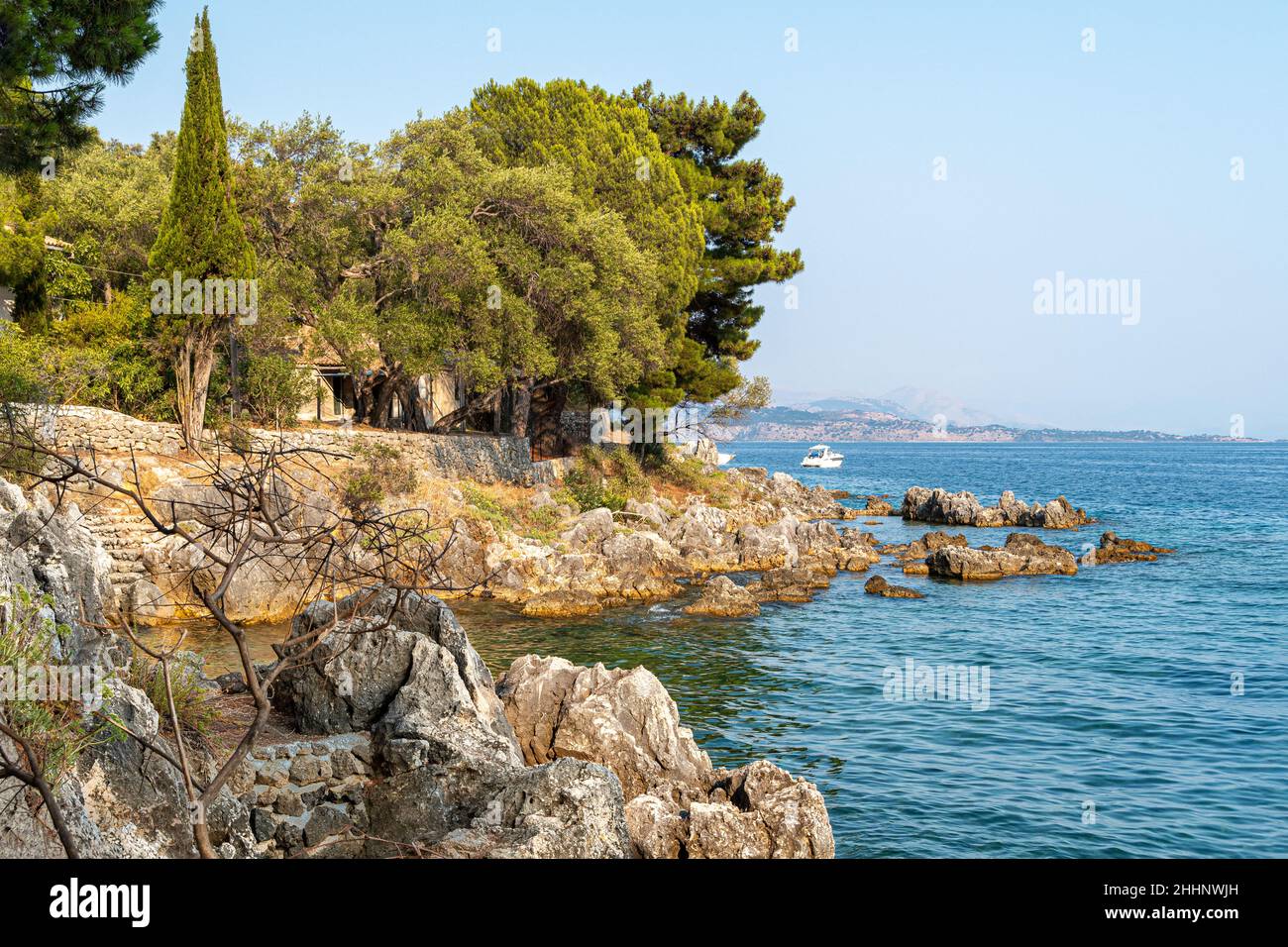 Ionian sea and coast  in Nissaki Kerkyra, in the Island of Corfu Ionian Islands Greece, Europe Stock Photo
