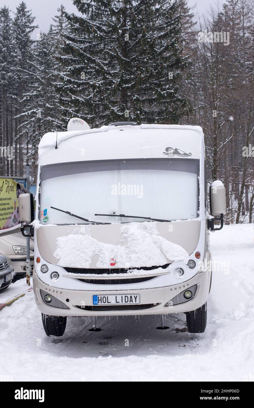 Pustevny Czech Rep 01-23-2022 parked RV with custom plate HOLLIDAY on a ...