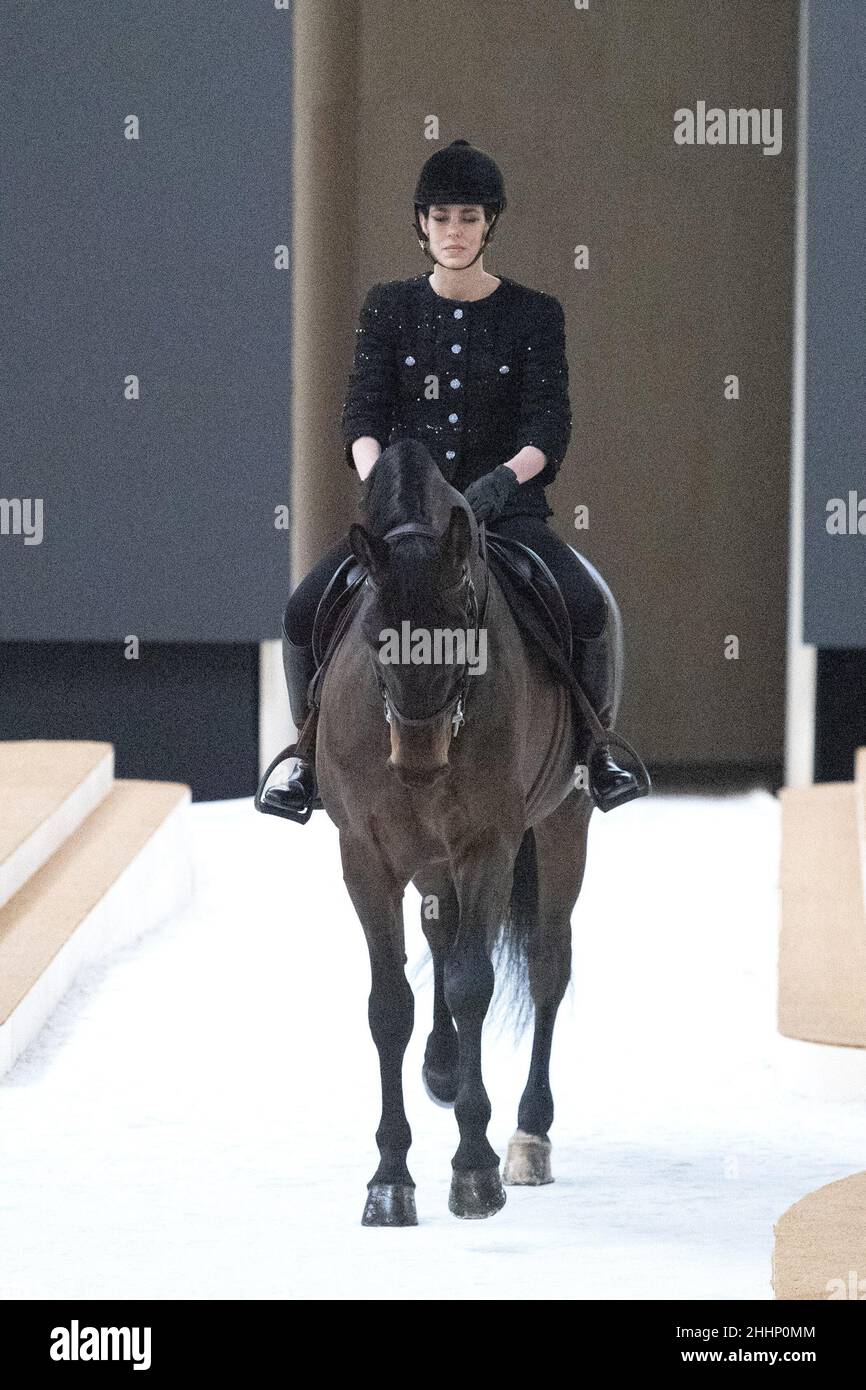 Charlotte Casiraghi rides a horse during the runway during the