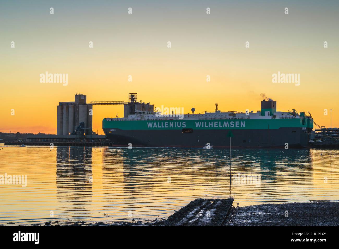 Sunset over Southampton Grain Terminal at the Eastern Docks - view from Woolston, Southampton Water, Southampton, Hampshire, England, UK Stock Photo