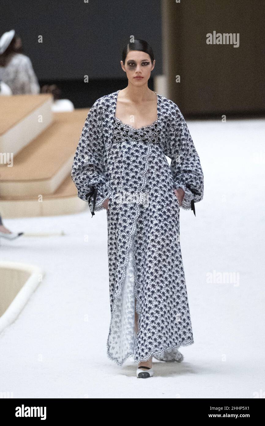 A model walks the runway during the Chanel Haute Couture Spring