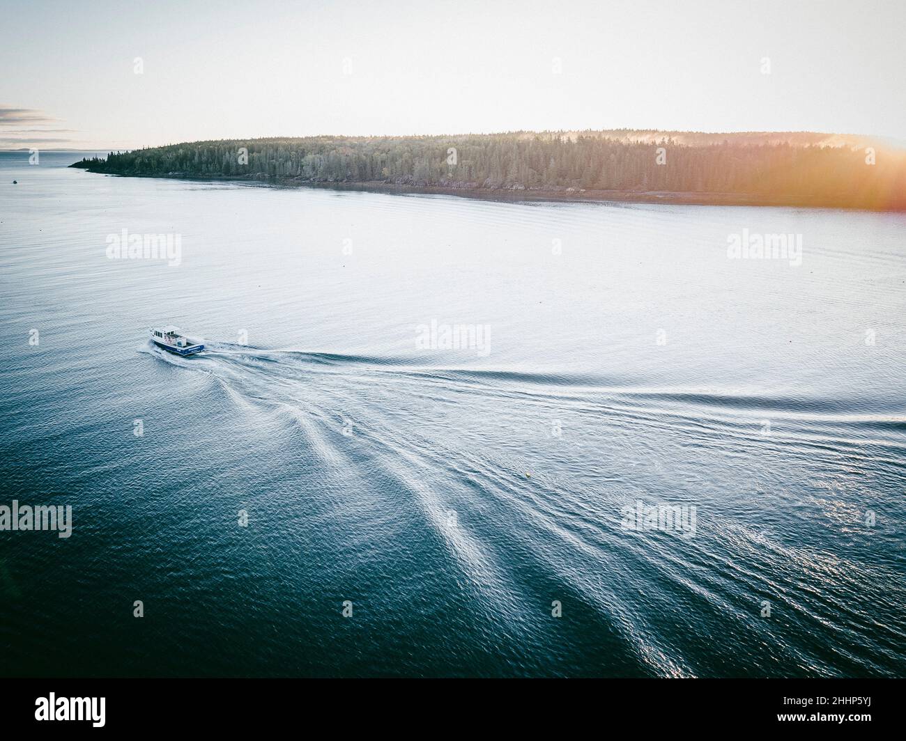 Aerial view of a fishing boat driving in the sea, in Owl's Head, Maine Stock Photo