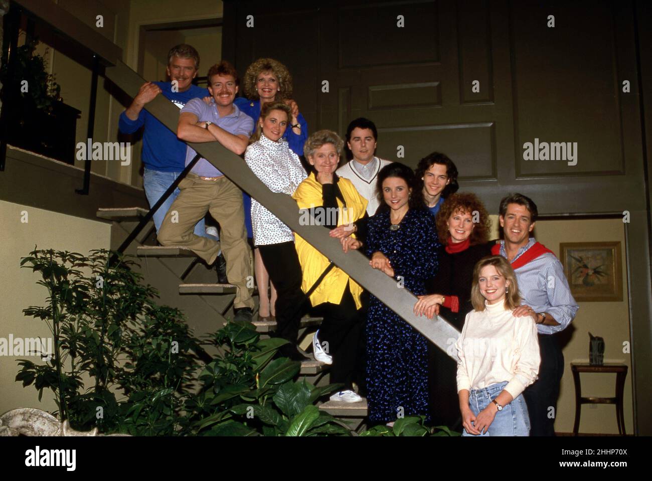 The Brady Bunch Cast - Robert Reed, Mike Lookinland, Florence Henderson, Maureen McCormick, Ann B. Davis and Christopher Knight and Day By Day Cast - Julia Louis-Dreyfuss, Christopher Daniel, Linda Kelsey, Courtney Thorne-Smith and Doug Sheehan Circa 1980's  Credit: Ralph Dominguez/MediaPunch Stock Photo