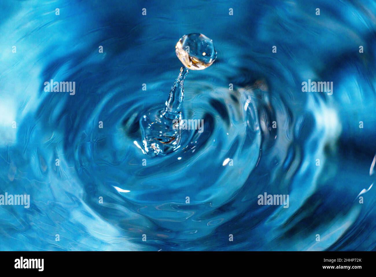 Water droplets make an impact when hitting the surface Stock Photo - Alamy