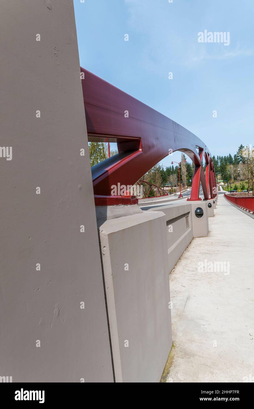 Closeup of the artistic arches showing how they are secured to the concrete barriers on the May Creek Bridge in Newcastle, Washington. Stock Photo