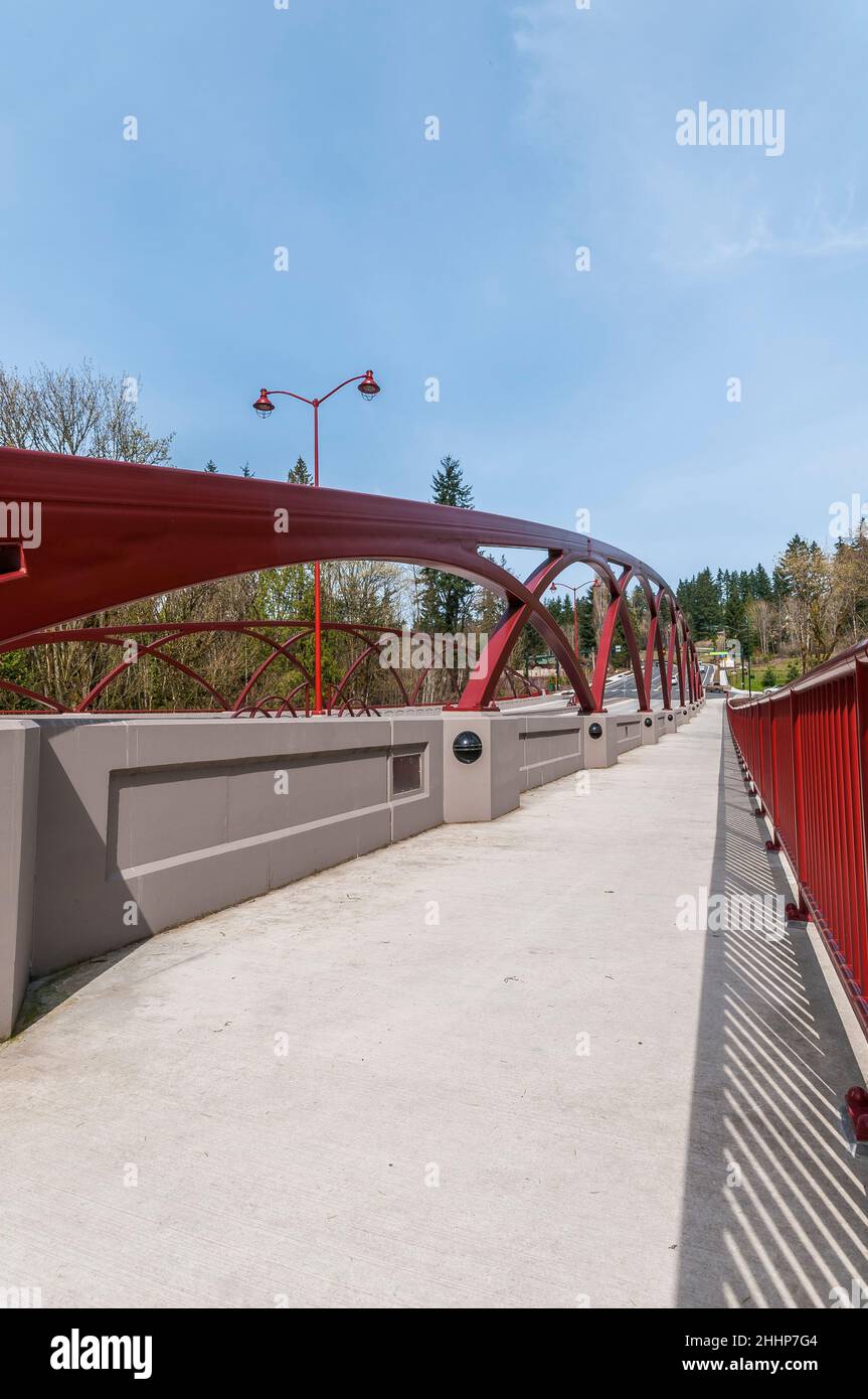 Closeup of the artistic arches showing how they are secured to the concrete barriers on the May Creek Bridge in Newcastle, Washington. Stock Photo