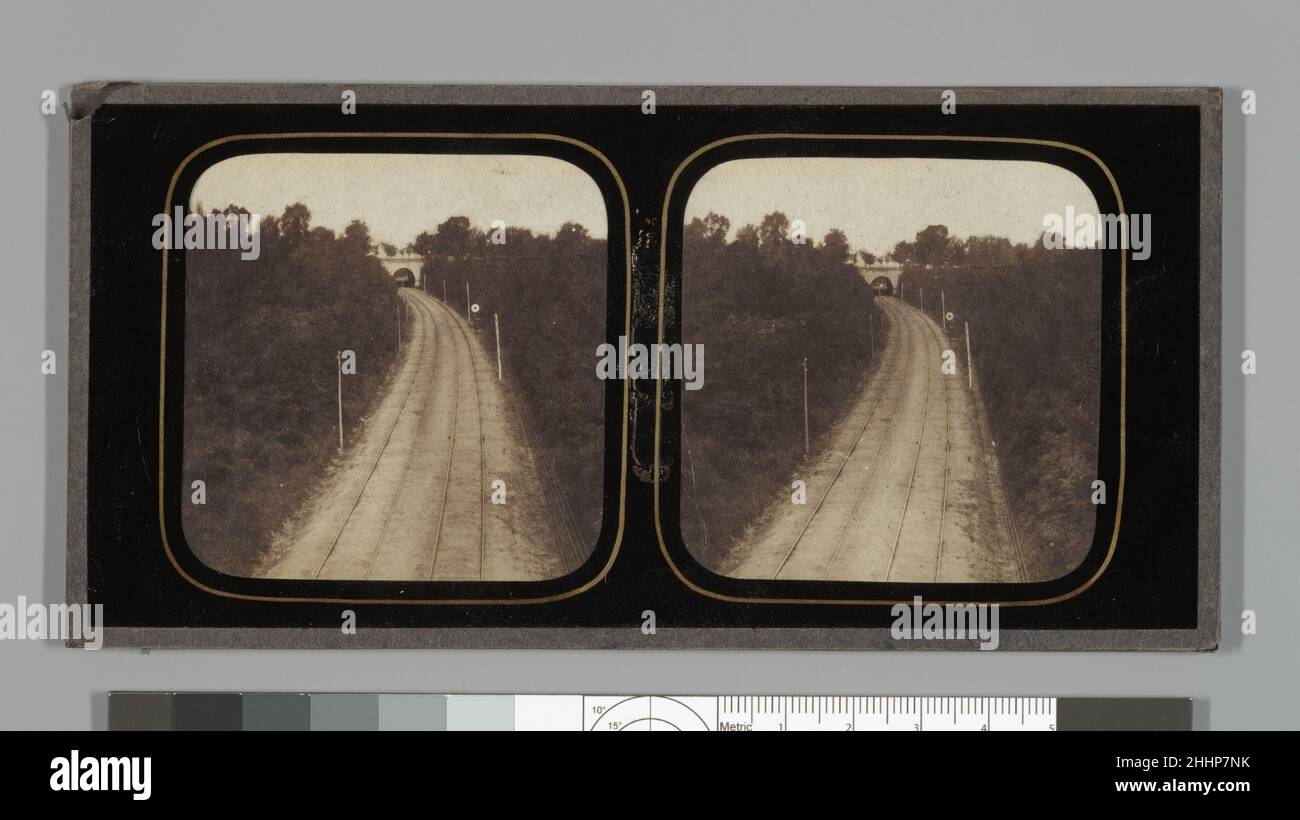 [Stereographic View of Paris-Lyon Railroad Tracks with 'Ghost' Train Visible When Viewed by Transmitted Light] ca. 1860 Unknown. [Stereographic View of Paris-Lyon Railroad Tracks with 'Ghost' Train Visible When Viewed by Transmitted Light]. Unknown (French). ca. 1860. Albumen silver print with applied color. Photographs Stock Photo
