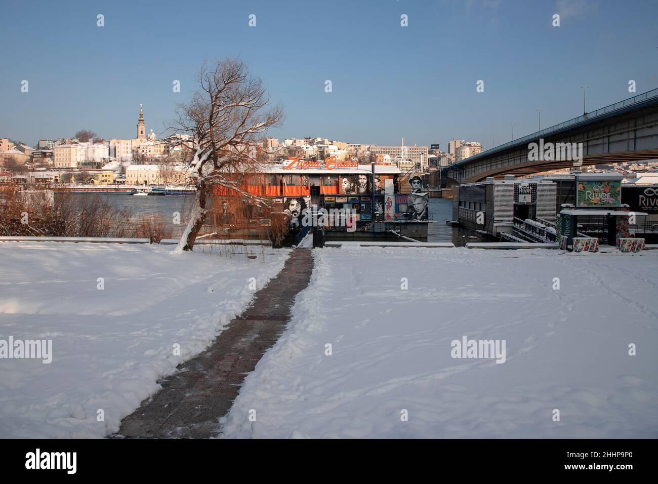 Serbia, Jan 2022: A row of raft house clubs along the Sava river in Belgrade Stock Photo