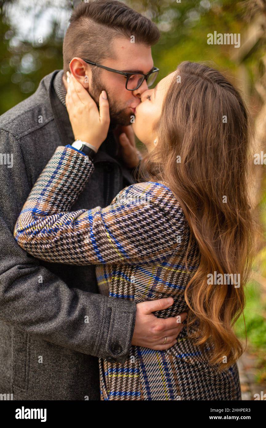 Young couple kissing model hi-res stock photography and images - Alamy