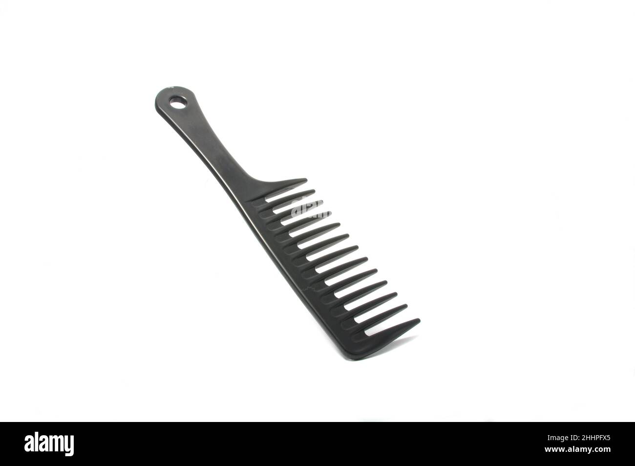Black plastic comb isolated on the white Stock Photo Alamy