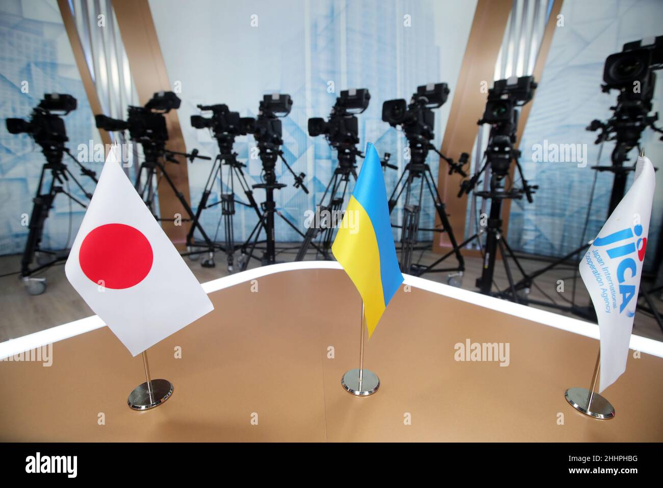 KYIV, UKRAINE - JANUARY 25, 2022 - The table flags of Japan and Ukraine are pictured during the official ceremony to convey new equipment from Japan t Stock Photo